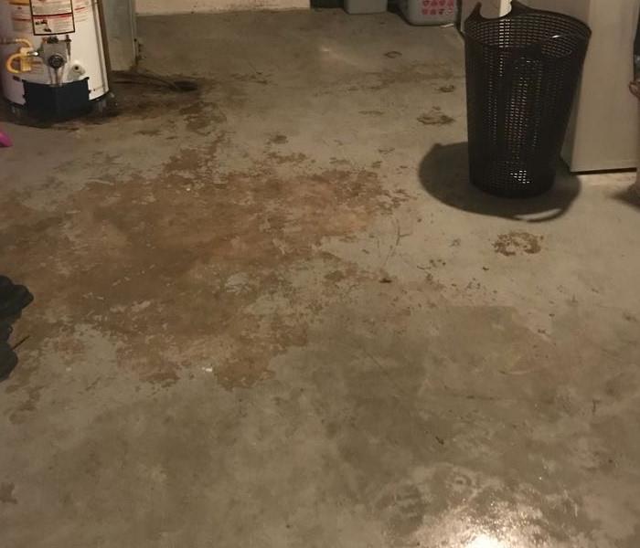 Unfinished basement cleaned up after sewer backup